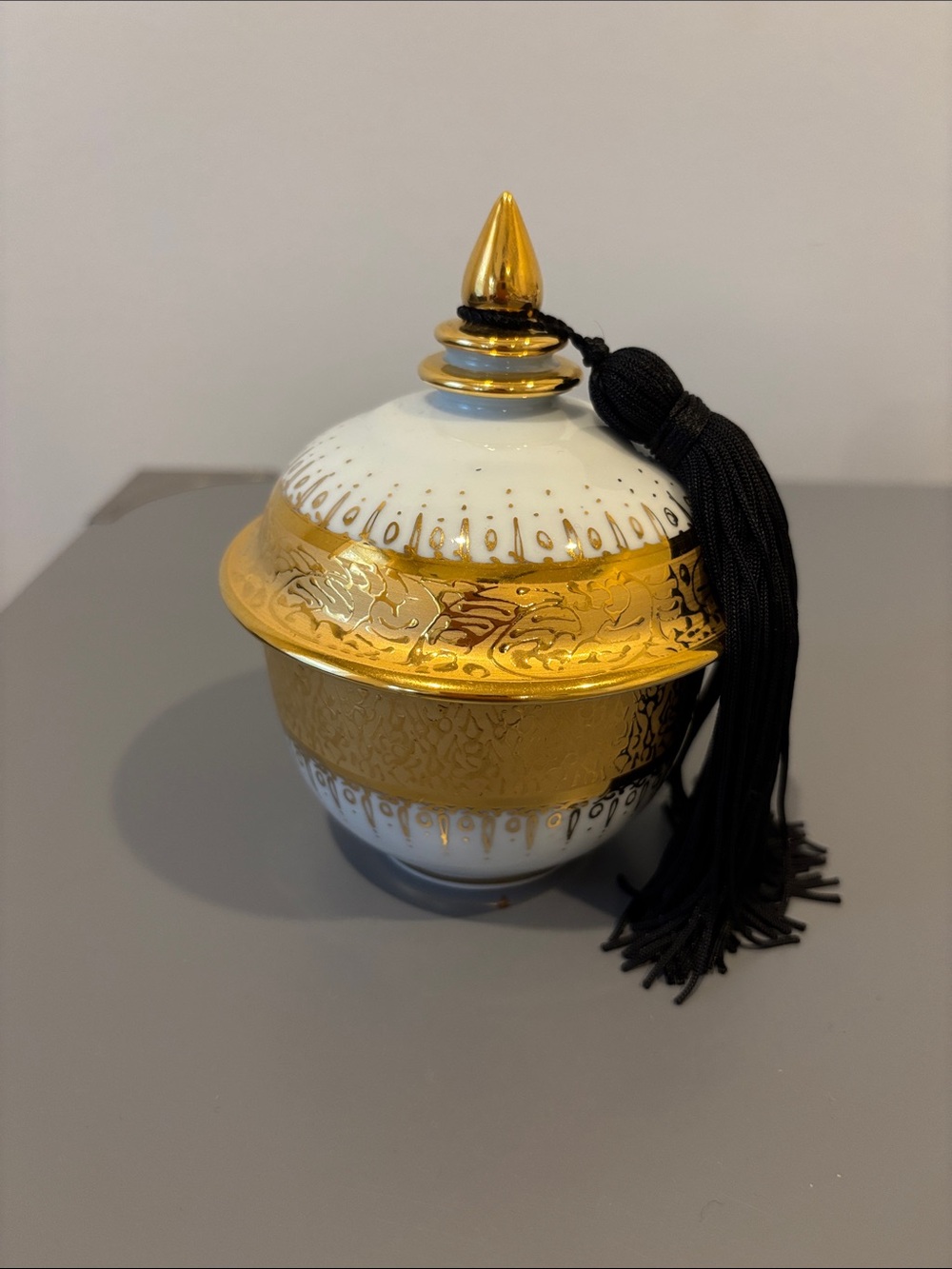 Gold and White Decorative Lidded Jar with Black Tassel